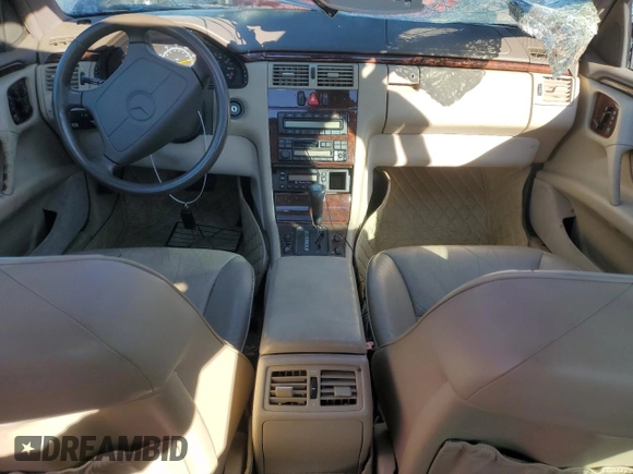1996 Mercedes-Benz E-Class with VIN WDBJF55FXTJ011680, listed as a Copart auction lot 88752555 with 0 mi miles and Salvage Title. Bid and sale history available at carsss.com. Image 8.
