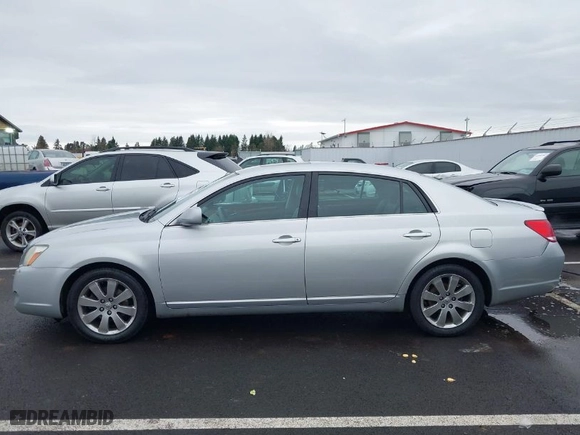 2005 Toyota Avalon XL with VIN 4T1BK36B85U027746, listed as a IAAI auction lot 41609354 with 183,844 mi miles. Bid and sale history available at carsss.com. Image 14.