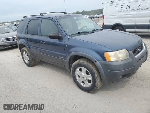 2001 Ford Escape XLT with VIN 1FMYU03131KF10968, listed as a Copart auction lot 67849474 with 197,328 mi miles and Salvage Title. Bid and sale history available at carsss.com. Image 4.