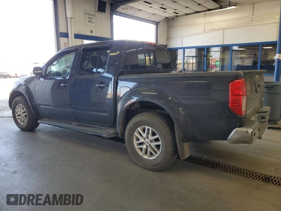 2014 Nissan Frontier SV with VIN 1N6AD0EV9EN710020, listed as a Copart auction lot 60895575 with 125,090 mi miles and Salvage title. Bid and sale history available at DreamBid. Image 2.