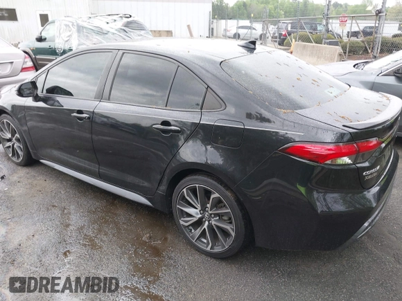 2021 Toyota Corolla XSE with VIN 5YFT4MCE1MP078086, listed as a IAAI auction lot 41894806 with 77,412 mi miles. Bid and sale history available at carsss.com. Image 3.