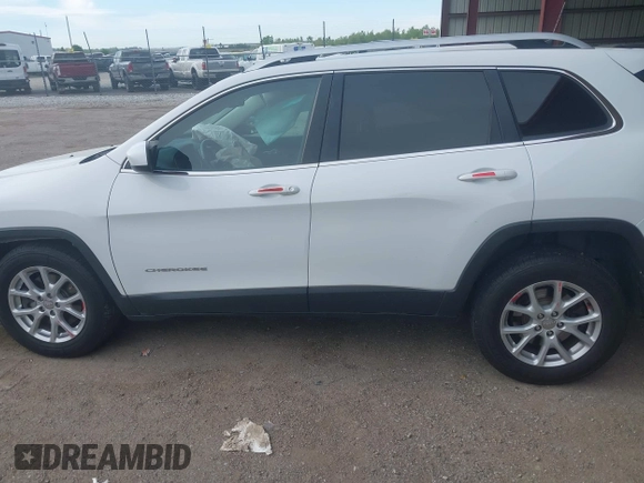 2017 Jeep Cherokee Latitude with VIN 1C4PJMCS3HD235562, listed as a IAAI auction lot 42203685 with 61,055 mi miles and . Bid and sale history available at DreamBid. Image 14.