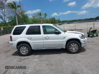 2006 Mercury Mariner Luxury with VIN 4M2YU56116KJ14472, listed as a IAAI auction lot 42349564 with 96,221 mi miles and . Bid and sale history available at DreamBid. Image 13.