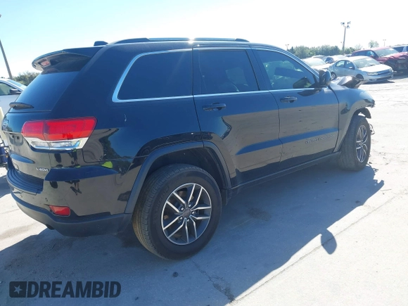 2019 Jeep Grand Cherokee Altitude with VIN 1C4RJEAGXKC621678, listed as a IAAI auction lot 41577884 with 87,014 mi miles and . Bid and sale history available at DreamBid. Image 4.