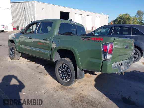 2021 Toyota Tacoma SR with VIN 3TYCZ5AN2MT039450, listed as a IAAI auction lot 40457613 with 54,176 mi miles and . Bid and sale history available at DreamBid. Image 3.