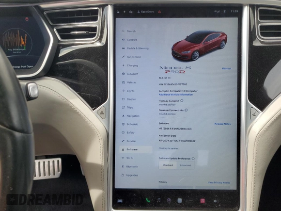 2016 Tesla Model S 90D with VIN 5YJSA1E42GF127593, listed as a Copart auction lot 52450495 with 144,151 mi miles and Salvage title. Bid and sale history available at DreamBid. Image 9.