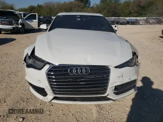 2016 Audi A6 2.0T Premium Plus with VIN WAUDFAFC1GN033686, listed as a Copart auction lot 74600634 with 142,751 mi miles and Salvage Title. Bid and sale history available at carsss.com. Image 5.