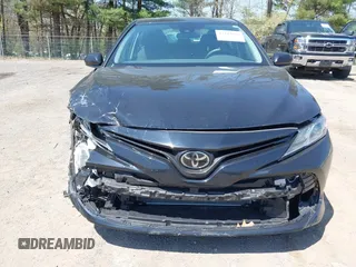 2020 Toyota Camry LE with VIN 4T1C11AK9LU387012, listed as a IAAI auction lot 42103647 with 64,049 mi miles and . Bid and sale history available at carsss.com. Image 13.
