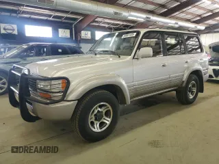 1996 Lexus LX 450 z VIN JT6HJ88J7T0132342, wystawiony jako Copart lot #59961405 z przebiegiem 203 942 mil mil oraz Czysty tytuł • Clean title. Historia ofert i sprzedaży dostępna na DreamBid. Obrazek 1.