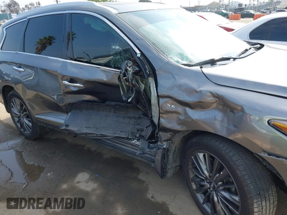 2020 Infiniti QX60 Luxe with VIN 5N1DL0MN2LC527549, listed as a IAAI auction lot 42408763 with 56,371 mi miles and . Bid and sale history available at DreamBid. Image 6.