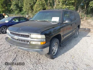 2003 Chevrolet Suburban LT z VIN 1GNEC16Z13J216552, wystawiony jako IAAI lot #40193670 z przebiegiem 235 840 mil mil oraz . Historia ofert i sprzedaży dostępna na DreamBid. Obrazek 2.