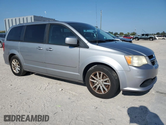 2014 Dodge Grand Caravan SXT z VIN 2C4RDGCG6ER223900, wystawiony jako Copart lot #56960965 z przebiegiem 101 275 mil mil oraz Szkoda całkowita • Salvage title. Historia ofert i sprzedaży dostępna na DreamBid. Obrazek 4.