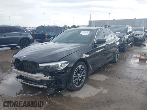 2020 BMW 5 Series 530i with VIN WBAJR3C08LWW77822, listed as a IAAI auction lot 41880376 with 52,533 mi miles and . Bid and sale history available at carsss.com. Image 2.