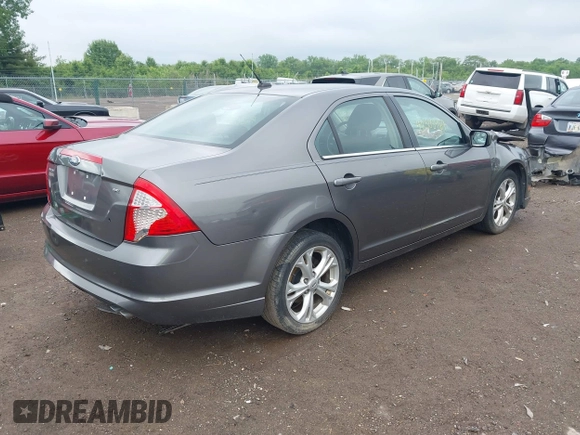 2012 Ford Fusion SE with VIN 3FAHP0HA4CR207481, listed as a IAAI auction lot 42308969 with 198,735 mi miles and . Bid and sale history available at DreamBid. Image 4.