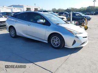 2018 Toyota Prius Two z VIN JTDKBRFU5J3591007, wystawiony jako IAAI lot #41677897 z przebiegiem 193 646 mil mil oraz . Historia ofert i sprzedaży dostępna na DreamBid. Obrazek 1.
