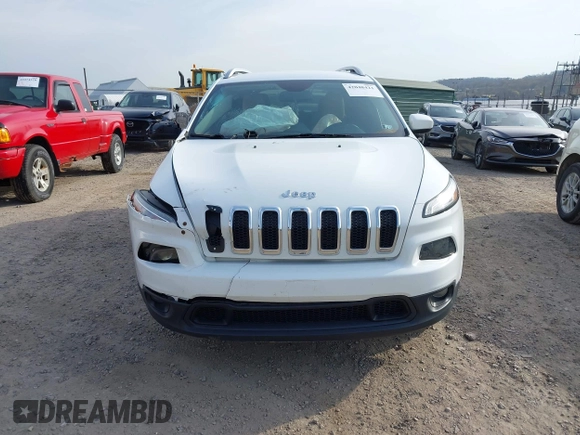 2016 Jeep Cherokee Latitude with VIN 1C4PJMCS1GW242545, listed as a IAAI auction lot 42048421 with 84,667 mi miles and . Bid and sale history available at carsss.com. Image 13.