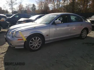 2002 Jaguar S-Type with VIN SAJDA03P22GM36867, listed as a Copart auction lot 79027454 with 52,489 mi miles and Salvage Title. Bid and sale history available at DreamBid. Image 1.