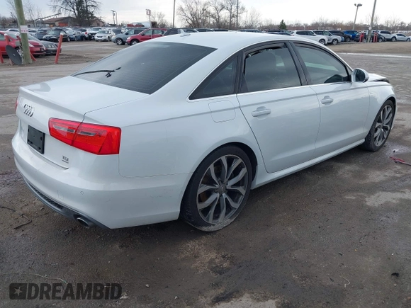 2014 Audi A6 Prestige z VIN WAUHMAFC6EN098487, wystawiony jako IAAI lot #41908034 z przebiegiem 146 298 mil mil oraz . Historia ofert i sprzedaży dostępna na DreamBid. Obrazek 4.
