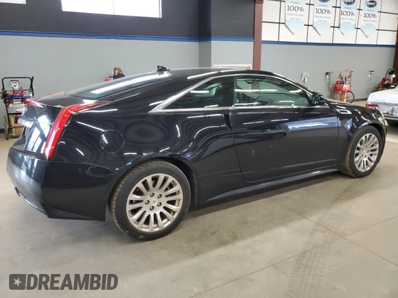 2013 Cadillac CTS Premium with VIN 1G6DP1E3XD0103876, listed as a Copart auction lot 53304795 with 94,963 mi miles and Salvage Title. Bid and sale history available at DreamBid. Image 3.
