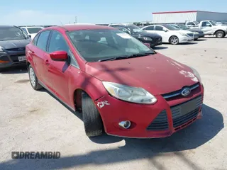 2012 Ford Focus SE with VIN 1FAHP3F21CL428659, listed as a IAAI auction lot 42040183 with 195,947 mi miles and . Bid and sale history available at carsss.com. Image 1.