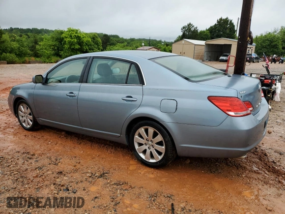 2005 Toyota Avalon XL z VIN 4T1BK36B65U041287, wystawiony jako Copart lot #56566535 z przebiegiem 223 562 mil mil oraz Szkoda całkowita • Salvage title. Historia ofert i sprzedaży dostępna na DreamBid. Obrazek 2.