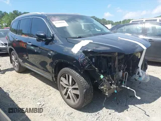 2017 Honda Pilot Touring with VIN 5FNYF5H9XHB024868, listed as a IAAI auction lot 42300608 with 133,018 mi miles and . Bid and sale history available at DreamBid. Image 1.
