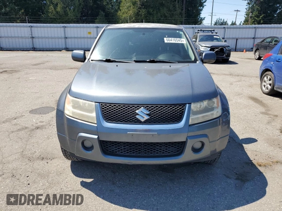 2008 Suzuki Grand Vitara w/Spare & Cargo Covers with VIN JS3TD941384103086, listed as a Copart auction lot 66416545 with 158,602 mi miles and Clean title. Bid and sale history available at DreamBid. Image 5.