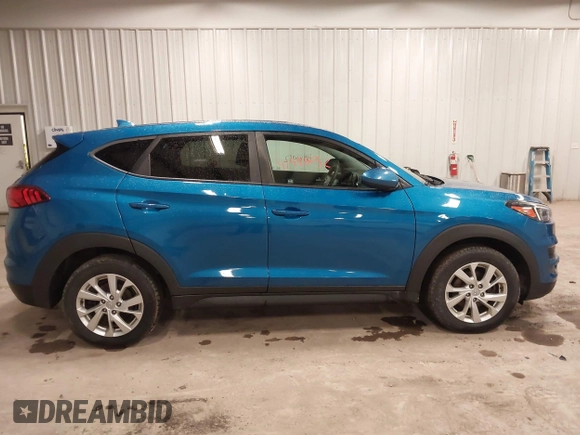 2019 Hyundai Tucson SE with VIN KM8J2CA48KU027746, listed as a IAAI auction lot 41986052 with 93,261 mi miles. Bid and sale history available at carsss.com. Image 14.
