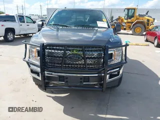 2018 Ford F-150 XL z VIN 1FTEW1E59JKC63060, wystawiony jako IAAI lot #42171237 z przebiegiem 113 405 mil mil oraz . Historia ofert i sprzedaży dostępna na DreamBid. Obrazek 12.