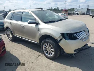 2011 Lincoln MKX with VIN 2LMDJ6JK1BBJ23342, listed as a IAAI auction lot 41517331 with 128,665 mi miles. Bid and sale history available at carsss.com. Image 1.