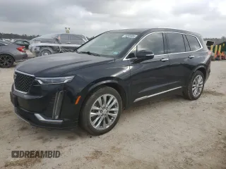 2022 Cadillac XT6 Premium Luxury with VIN 1GYKPERS4NZ105532, listed as a Copart auction lot 44335695 with 99,336 mi miles and Salvage Title. Bid and sale history available at DreamBid. Image 1.