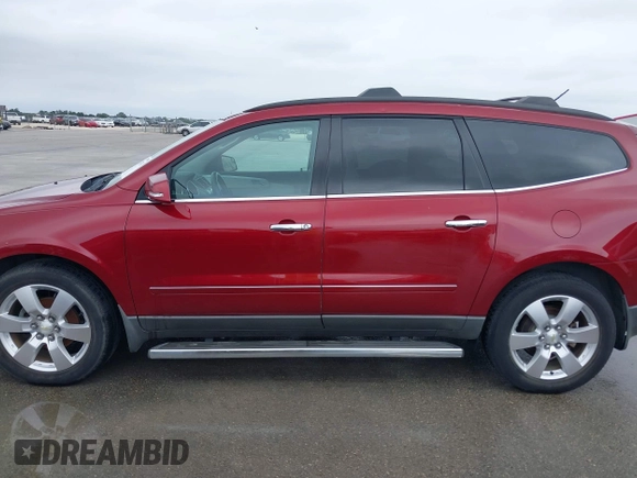 2011 Chevrolet Traverse LTZ z VIN 1GNKRLED6BJ142238, wystawiony jako IAAI lot #42183153 z przebiegiem 149 483 mil mil oraz . Historia ofert i sprzedaży dostępna na DreamBid. Obrazek 14.