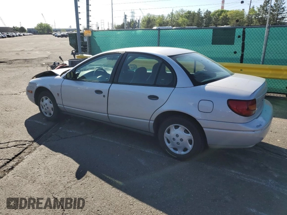 2001 Saturn SL z VIN 1G8ZH52891Z317279, wystawiony jako Copart lot #55163885 z przebiegiem 136 029 mil mil oraz Nie do naprawy • Non repairable. Historia ofert i sprzedaży dostępna na DreamBid. Obrazek 2.