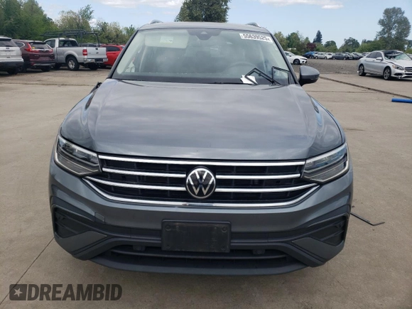 2023 Volkswagen Tiguan SE с VIN 3VVMB7AX7PM008282, выставлен на аукционе Copart как лот 55639525 с пробегом 32 490 миль миль и Списание • Salvage title. История ставок и продаж доступна на DreamBid. Изображение 5.
