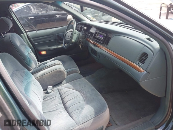 1995 Ford Crown Victoria LX с VIN 2FALP74W9SX120258, выставлен на аукционе IAAI как лот 42414057 с пробегом 210 215 миль миль и . История ставок и продаж доступна на DreamBid. Изображение 5.