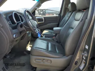 2007 Honda Ridgeline RTL w/Leather with VIN 2HJYK16587H531177, listed as a Copart auction lot 70881344 with 196,938 mi miles and Salvage Title. Bid and sale history available at carsss.com. Image 7.