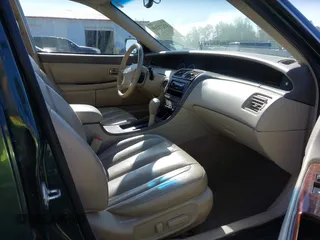 2000 Toyota Avalon XL z VIN 4T1BF28B2YU092348, wystawiony jako IAAI lot #42271599 z przebiegiem 179 560 mil mil oraz . Historia ofert i sprzedaży dostępna na DreamBid. Obrazek 5.