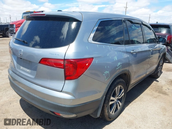 2018 Honda Pilot EX-L with VIN 5FNYF5H61JB008134, listed as a IAAI auction lot 42193142 with 100,254 mi miles and . Bid and sale history available at DreamBid. Image 4.