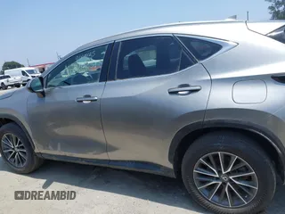 2022 Lexus NX 350 Premium z VIN 2T2GGCEZ1NC008202, wystawiony jako IAAI lot #42438898 z przebiegiem 14 729 mil mil oraz . Historia ofert i sprzedaży dostępna na DreamBid. Obrazek 14.