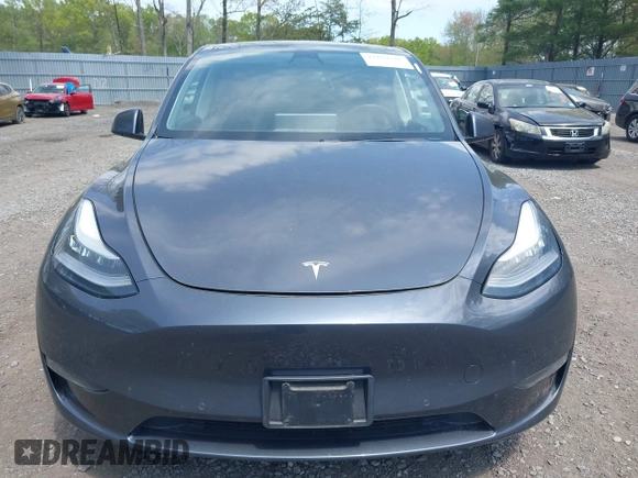2020 Tesla Model Y Long Range with VIN 5YJYGDEE2LF029385, listed as a IAAI auction lot 42164786 with 58,685 mi miles and . Bid and sale history available at DreamBid. Image 12.
