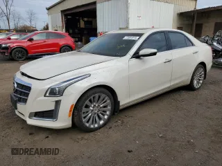 2014 Cadillac CTS Luxury AWD with VIN 1G6AX5SXXE0169881, listed as a Copart auction lot 77591974 with 134,876 mi miles and Salvage Title. Bid and sale history available at DreamBid. Image 1.