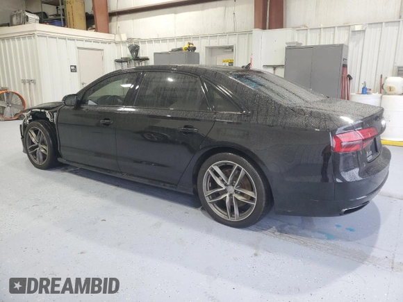2017 Audi A8 Sport z VIN WAU43AFD4HN020515, wystawiony jako Copart lot #44953055 z przebiegiem 115 422 mil mil oraz Szkody całkowita. Historia ofert i sprzedaży dostępna na DreamBid. Obrazek 2.