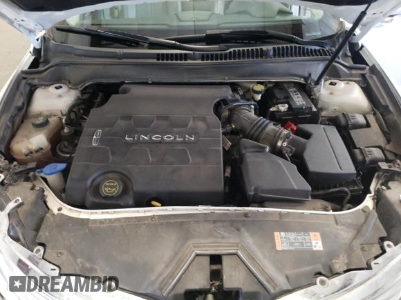 2016 Lincoln MKZ z VIN 3LN6L2GK6GR624511, wystawiony jako Copart lot #56137625 z przebiegiem 88 289 mil mil oraz Szkoda całkowita • Salvage title. Historia ofert i sprzedaży dostępna na DreamBid. Obrazek 11.