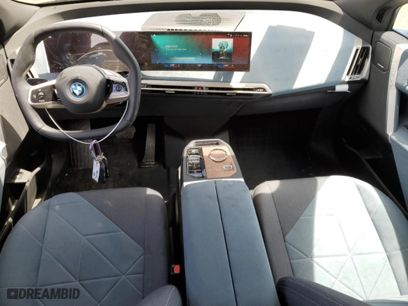 2023 BMW iX xDrive50 with VIN WB523CF03PCM09655, listed as a Copart auction lot 52922124 with 3,159 mi miles. Bid and sale history available at carsss.com. Image 8.