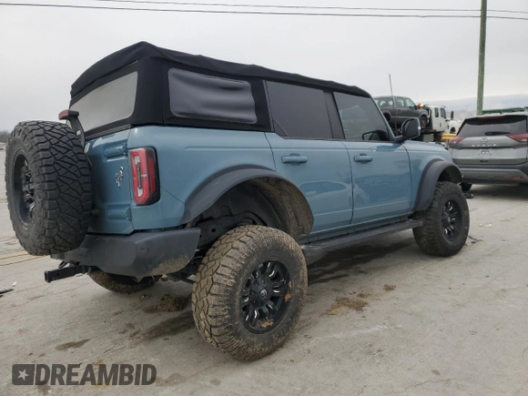 2021 Ford Bronco with VIN 1FMEE5DP3MLB01982, listed as a Copart auction lot 48349085 with 91,060 mi miles and Salvage Title. Bid and sale history available at DreamBid. Image 3.