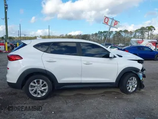 2019 Hyundai Tucson SE with VIN KM8J2CA48KU951829, listed as a IAAI auction lot 41261166 with 100,533 mi miles. Bid and sale history available at carsss.com. Image 13.