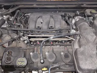 2015 Ford Taurus Limited with VIN 1FAHP2J86FG106828, listed as a IAAI auction lot 41748997 with 221,216 mi miles. Bid and sale history available at carsss.com. Image 10.