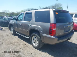 2013 Chevrolet Tahoe LT with VIN 1GNSKBE09DR325729, listed as a IAAI auction lot 41989587 with 186,361 mi miles and . Bid and sale history available at DreamBid. Image 3.