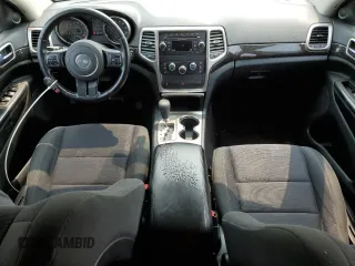 2011 Jeep Grand Cherokee Laredo with VIN 1J4RR4GGXBC567450, listed as a Copart auction lot 60056085 with 165,077 mi miles and Salvage title. Bid and sale history available at DreamBid. Image 8.
