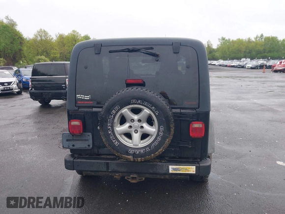 2004 Jeep Wrangler X with VIN 1J4FA39S94P707411, listed as a IAAI auction lot 42187856 with 189,519 mi miles. Bid and sale history available at carsss.com. Image 16.